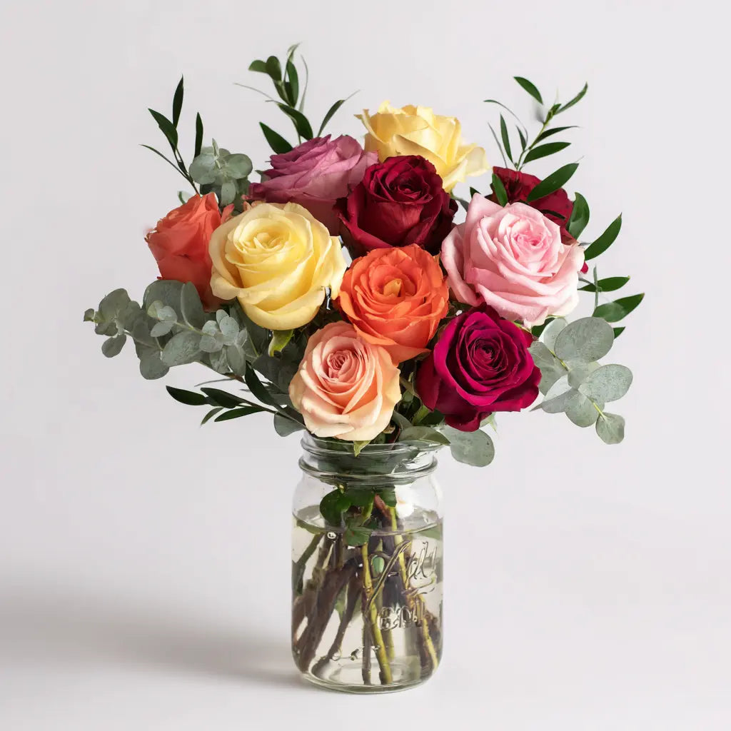 Colourful Roses in Mason Jar Send Blooms