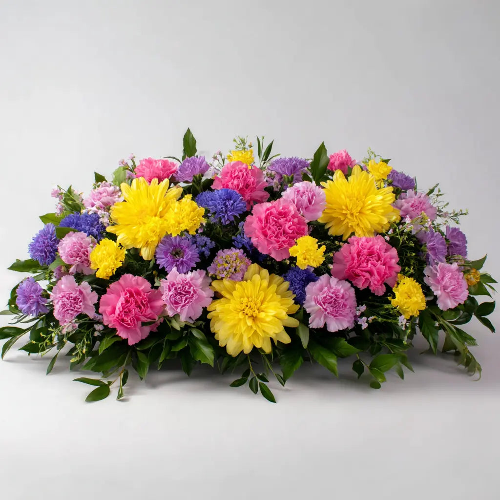 Remembering Joy Casket Spray Flower Arrangement Send Blooms