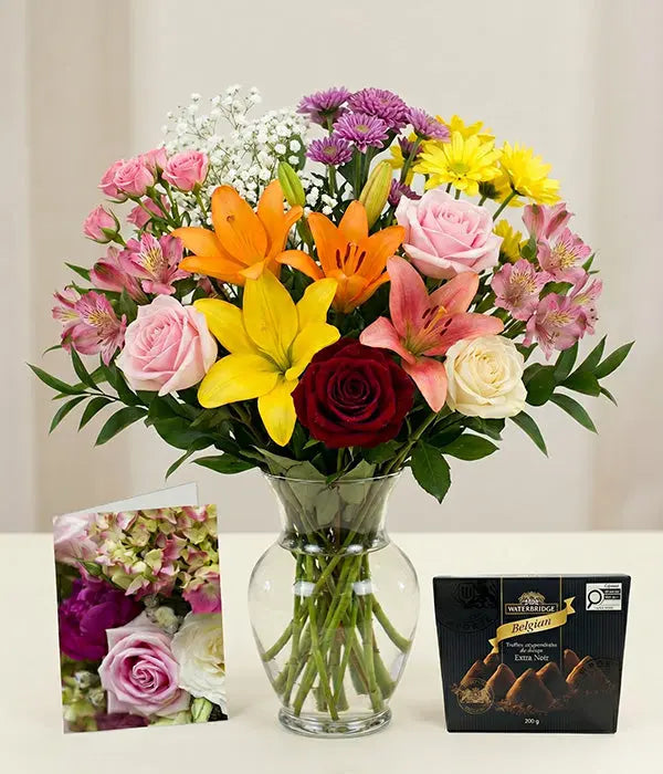 Luxury Bouquet Designer's Choice with Vase, Card & Truffles Send Blooms