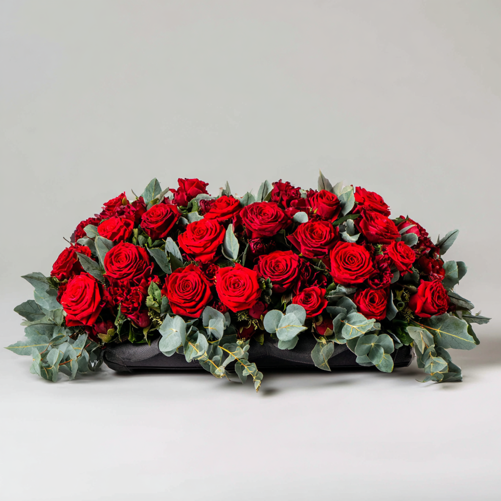 Remembered in Glory Casket Arrangement